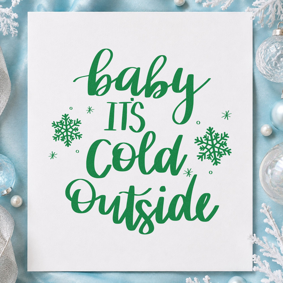 Baby Cold Outside Snowflakes craft stamp imprinted in green ink on paper, a design suited to framed writing nook.