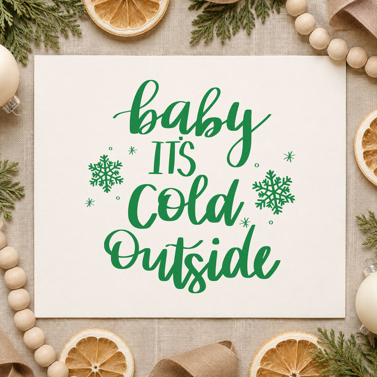 Baby Cold Outside Snowflakes craft stamp imprint in green ink on a handmade project, one idea being reply slip cards.