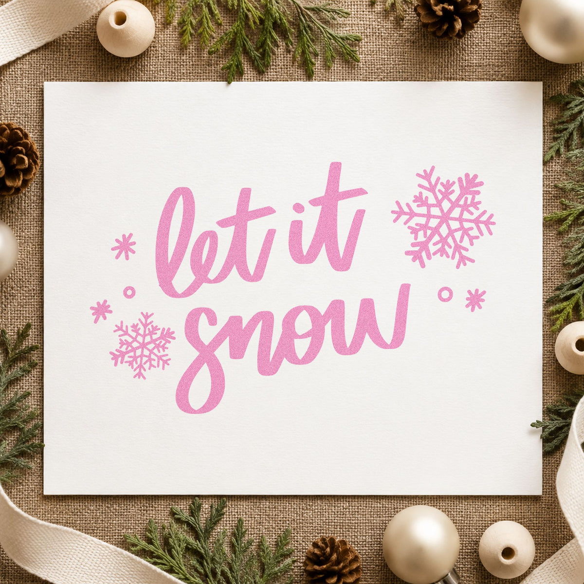 Let It Snow Script Snowflakes craft stamp in purple ink on cardstock, an easy option for basic album header.