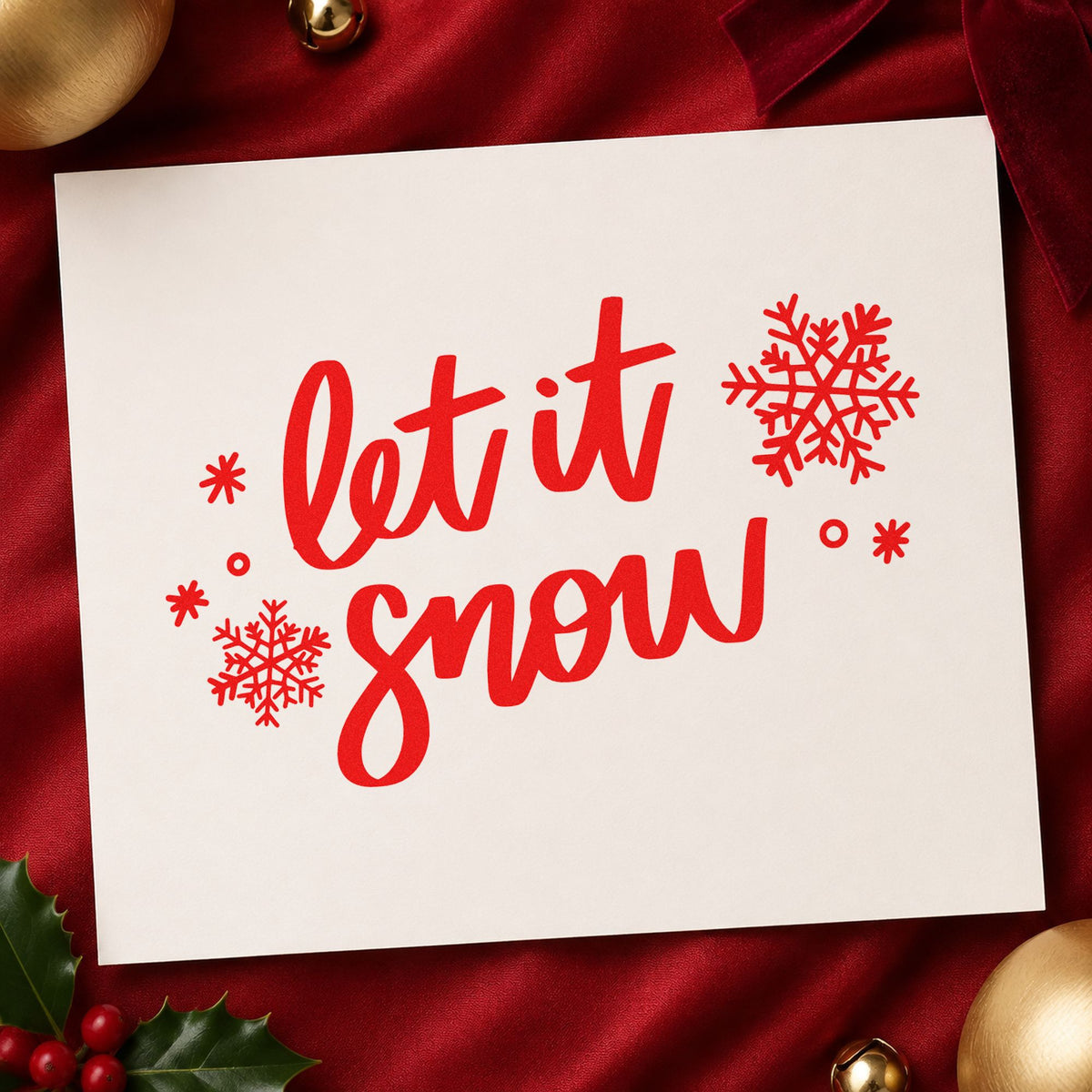 Let It Snow Script Snowflakes craft stamp in red ink on cardstock, an easy option for tea towel printing.