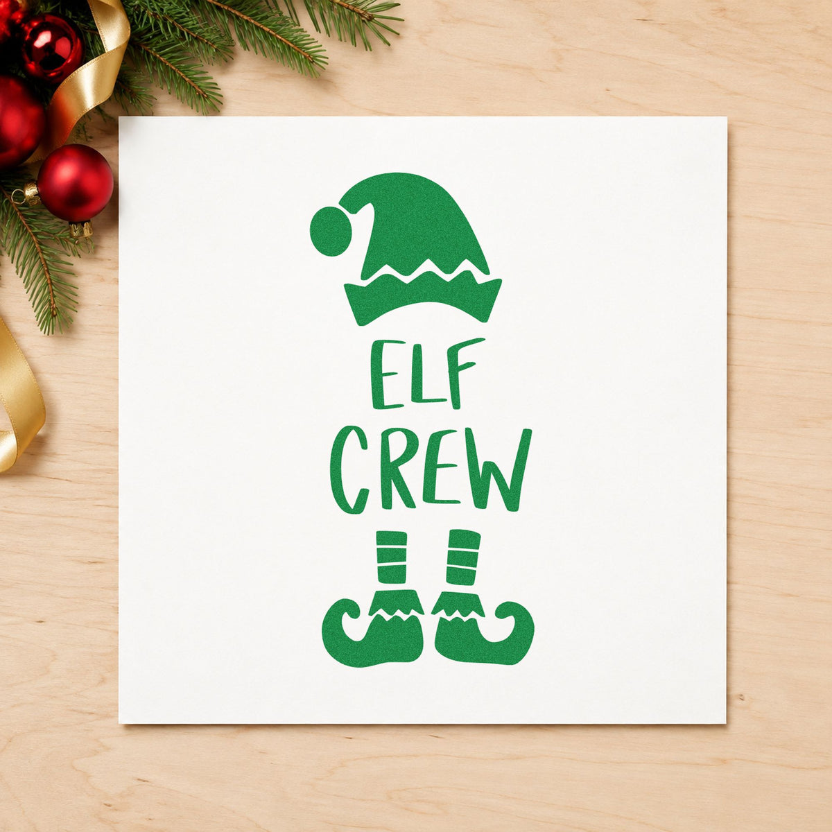 Elf Crew Hat And Shoes craft stamp imprint in green ink on a handmade project, one idea being striped sock tags.