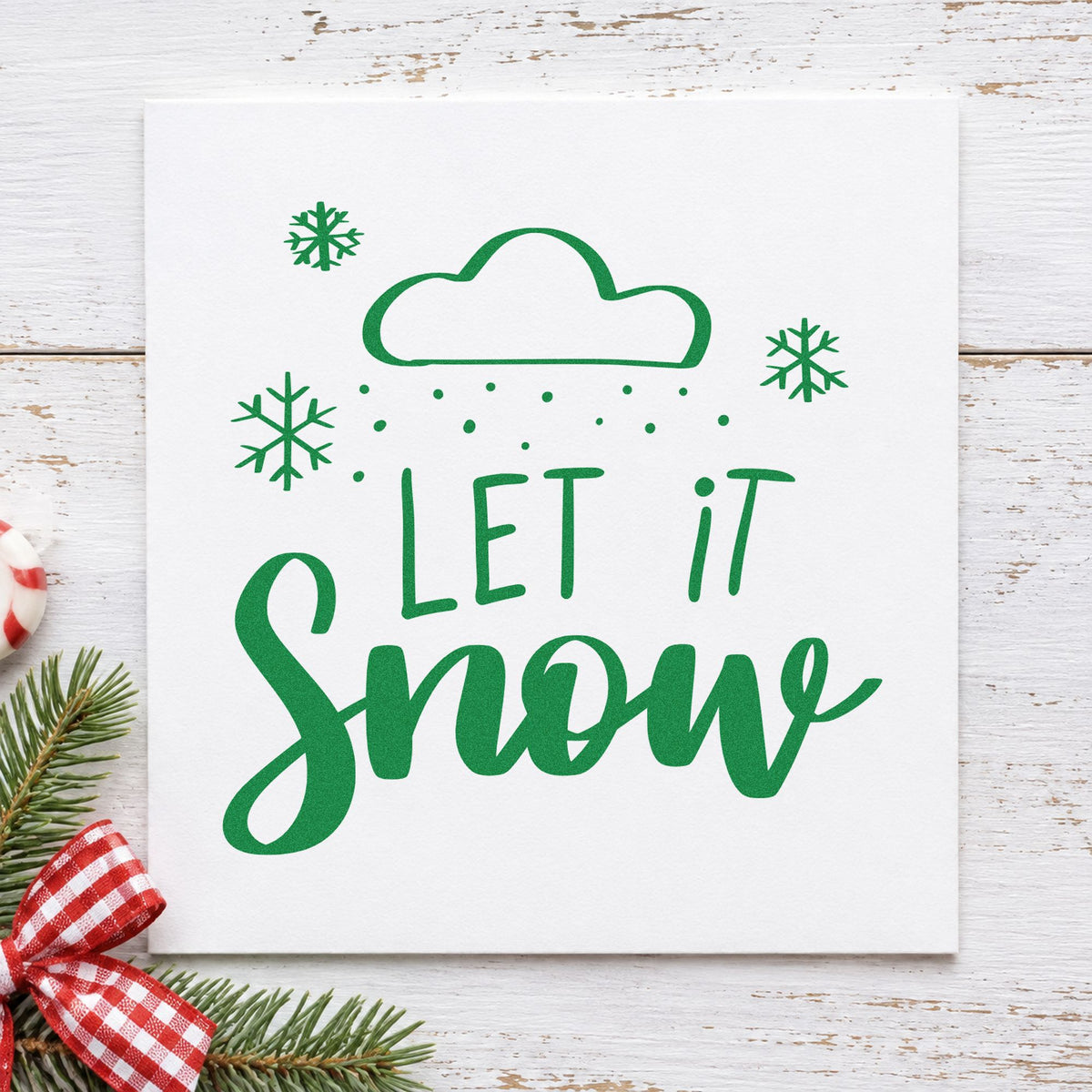 Let It Snow Cloud craft stamp imprinted in green ink on paper, a design suited to framed ceiling nook.