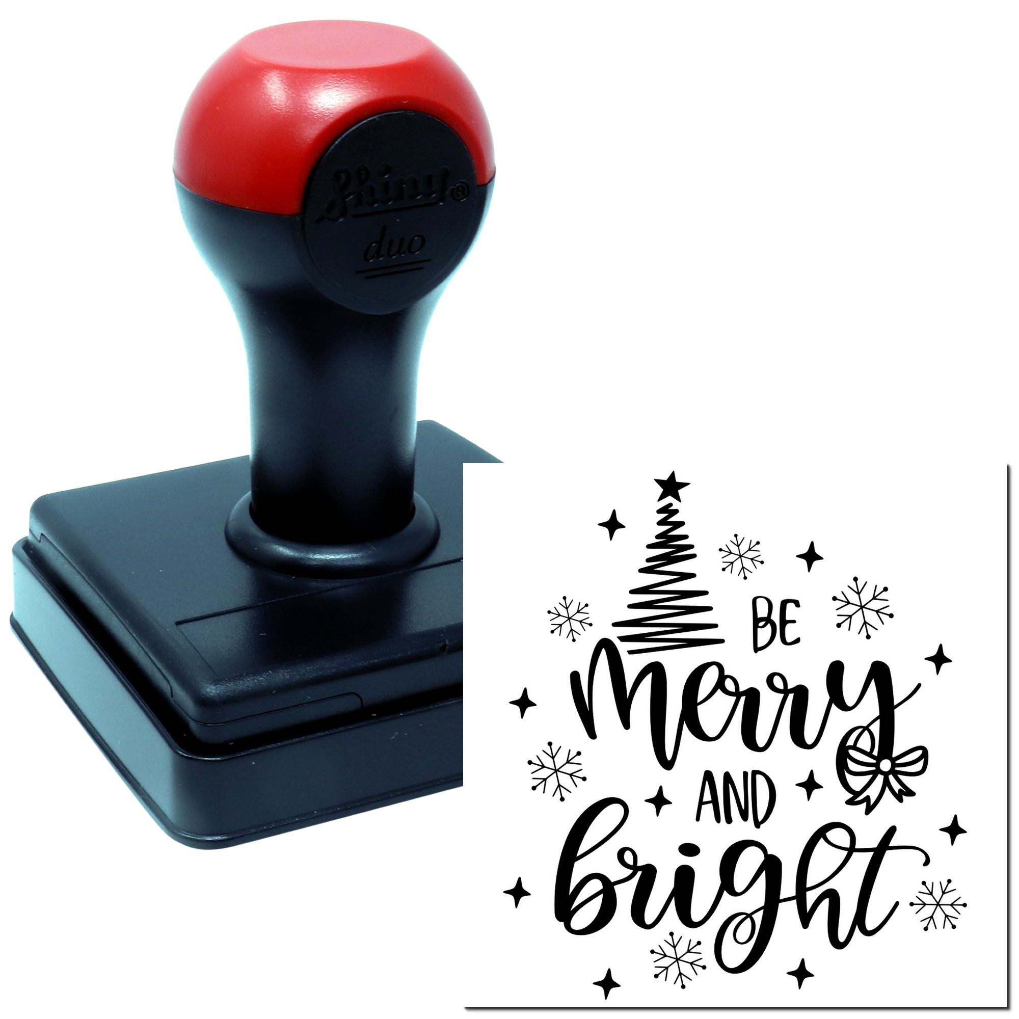 Self-inking rubber stamp with Merry and Bright holiday design, featuring Christmas tree, snowflakes, stars, and bow.