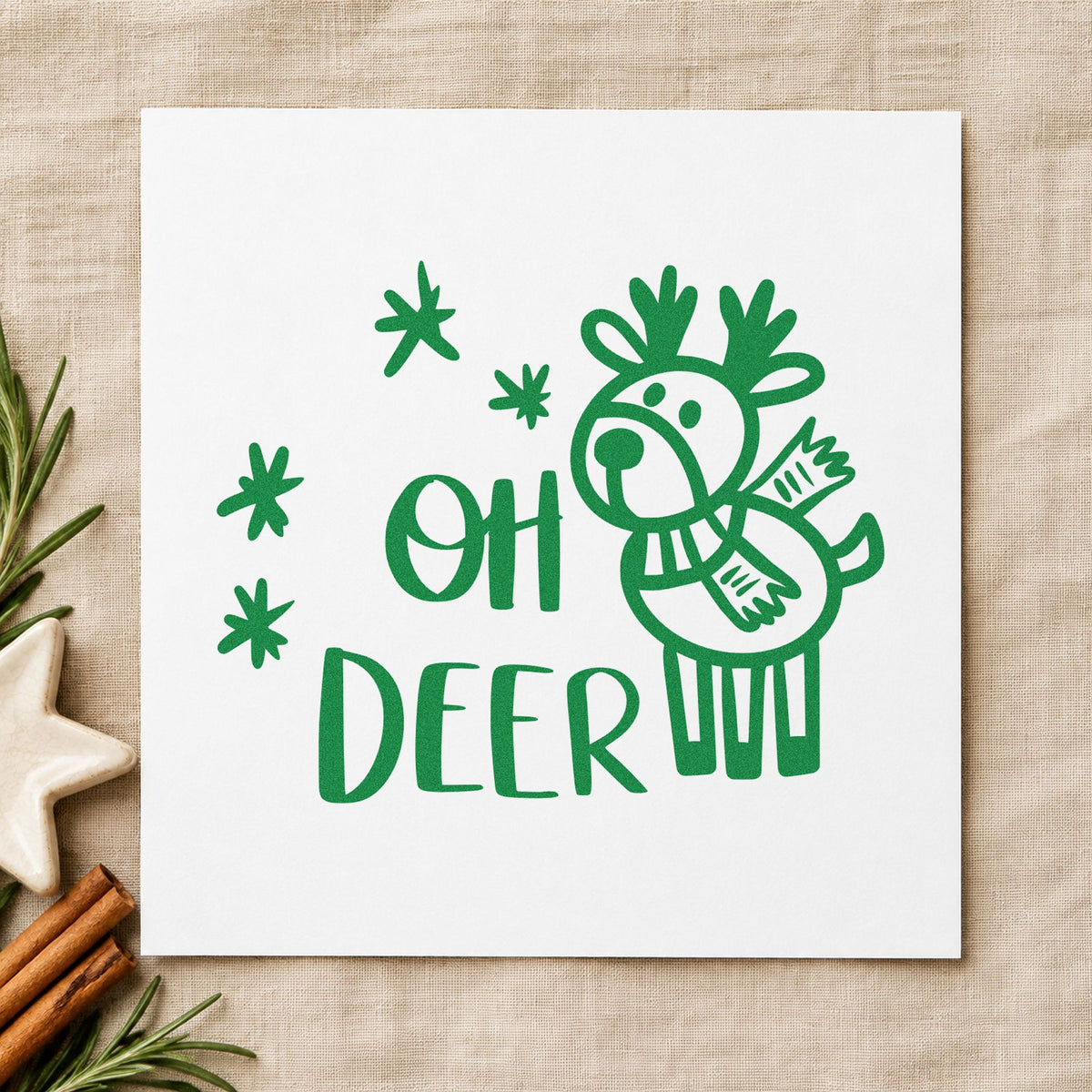 Oh Deer Cartoon Reindeer craft stamp imprint in green ink on a handmade project, one idea being party favor cards.