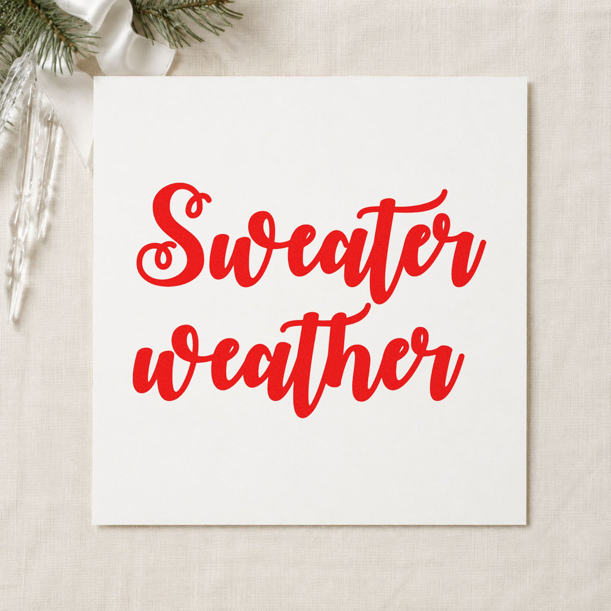 Sweater Weather Brush Script rubber stamp shown in red ink, stamped for projects such as crate face labels.