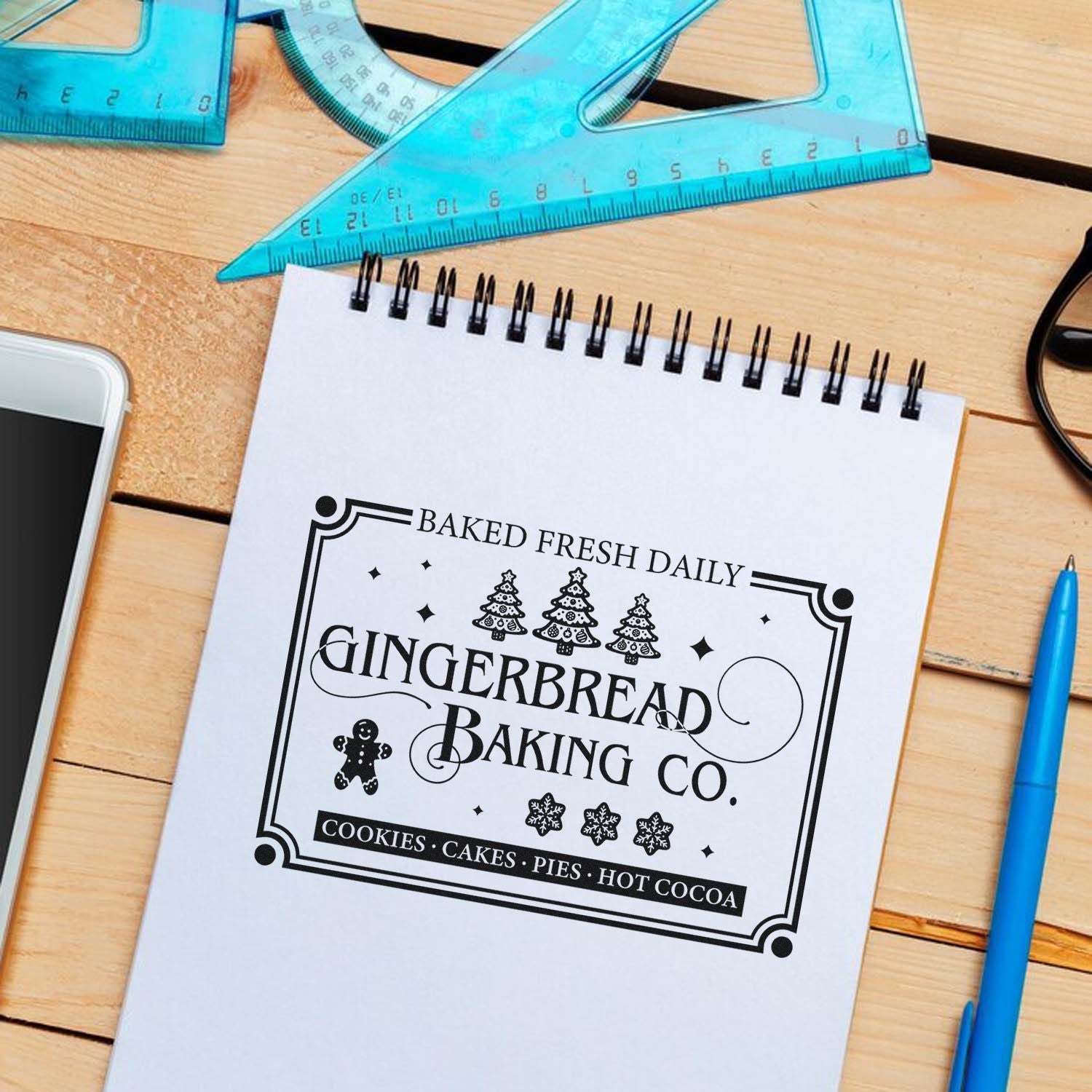 Custom rubber stamp design for Gingerbread Baking Co. bakery, featuring baked fresh daily, cookies, cakes, pies, and hot cocoa.