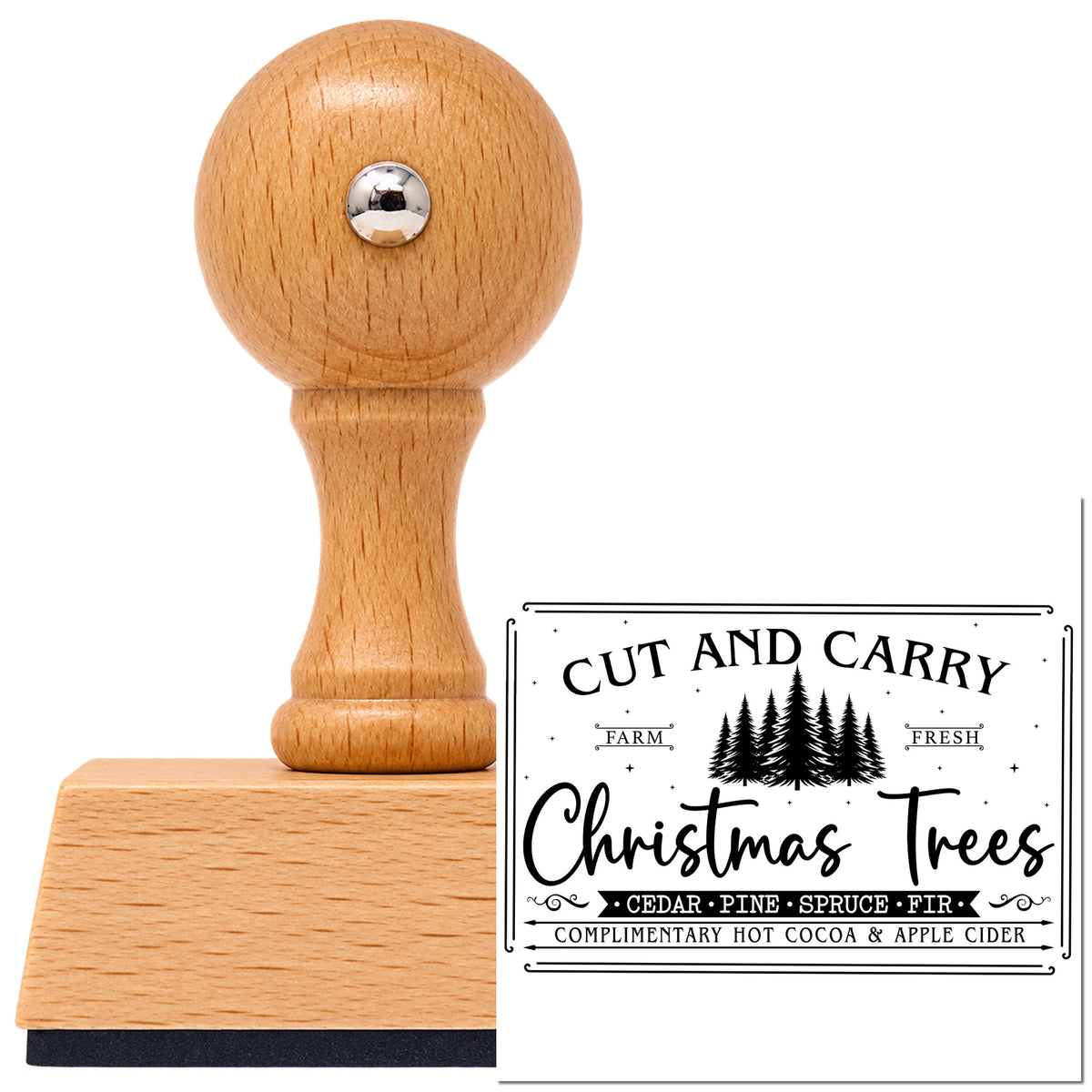 Cut And Carry Christmas Trees Vintage Pro rubber stamp in European beech wood with a round knob handle, shown beside its black imprint.