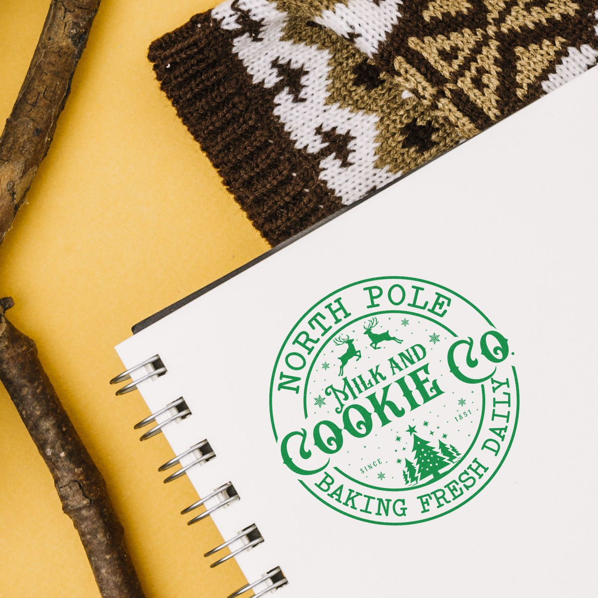 North Pole Cookie Company Badge rubber stamp shown in brown ink, stamped for projects such as route album page.