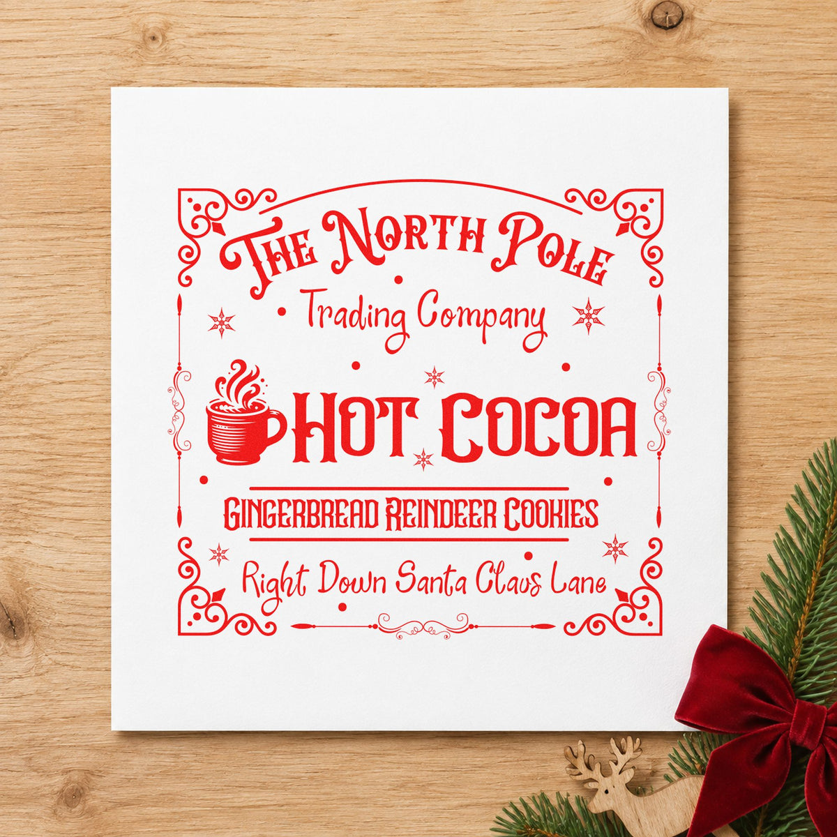 North Pole Trading Hot Cocoa craft stamp in red ink on cardstock, an easy option for counter mat printing.