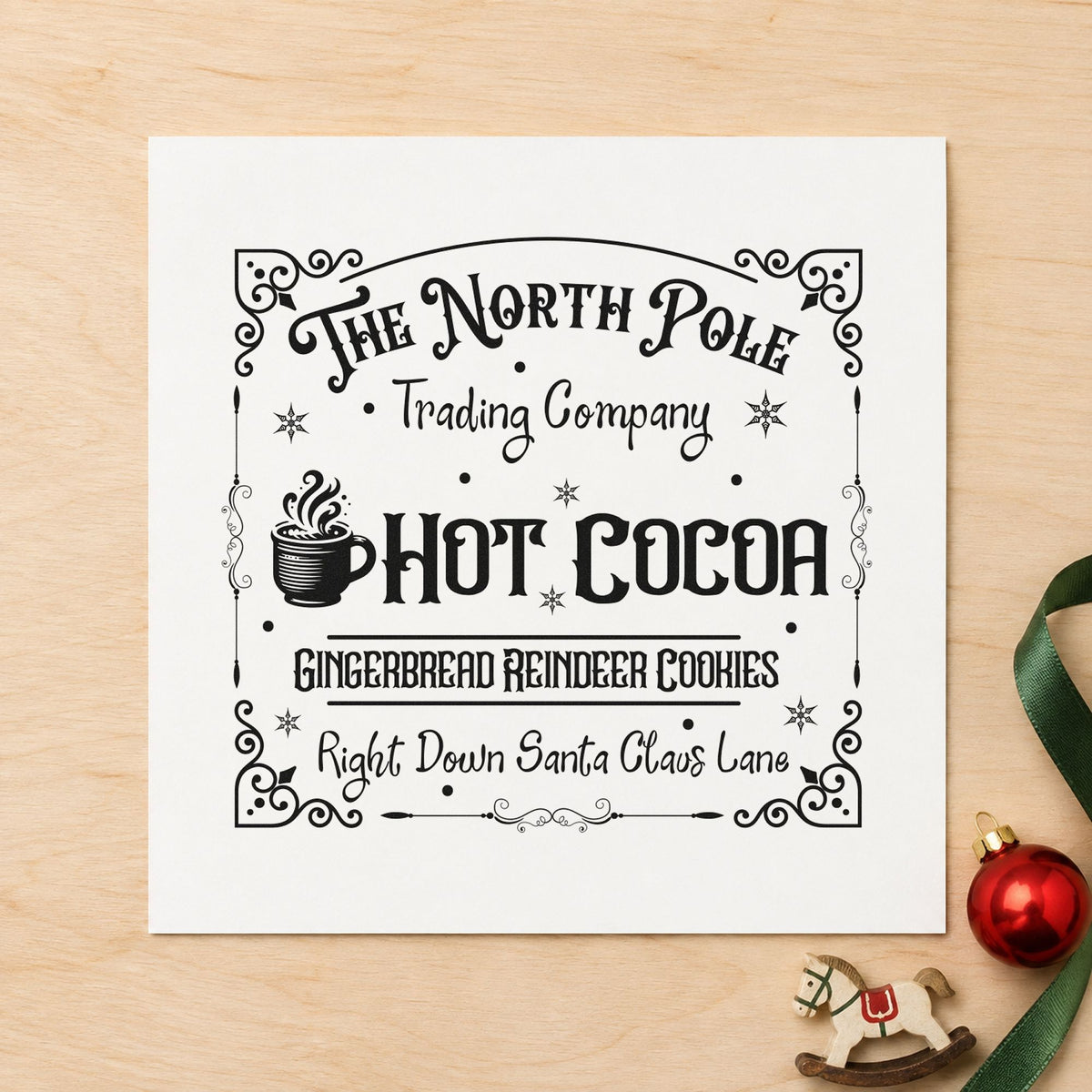 North Pole Trading Hot Cocoa rubber stamp printed in black ink, ready for steaming mug cards and similar paper crafts.