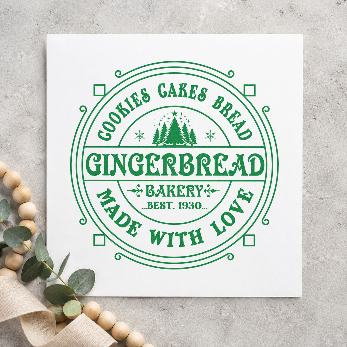 Gingerbread Bakery Made With Love craft stamp imprint in green ink on a handmade project, one idea being anniversary slips.