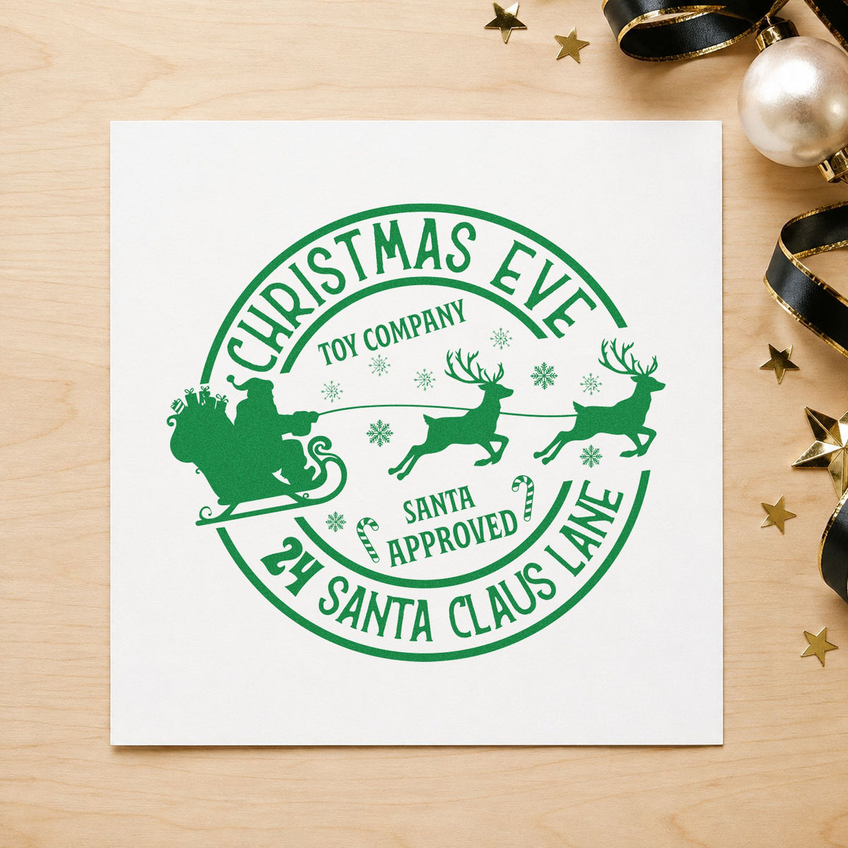 Christmas Eve Toy Company craft stamp in green ink on cardstock, an easy option for workshop album page.