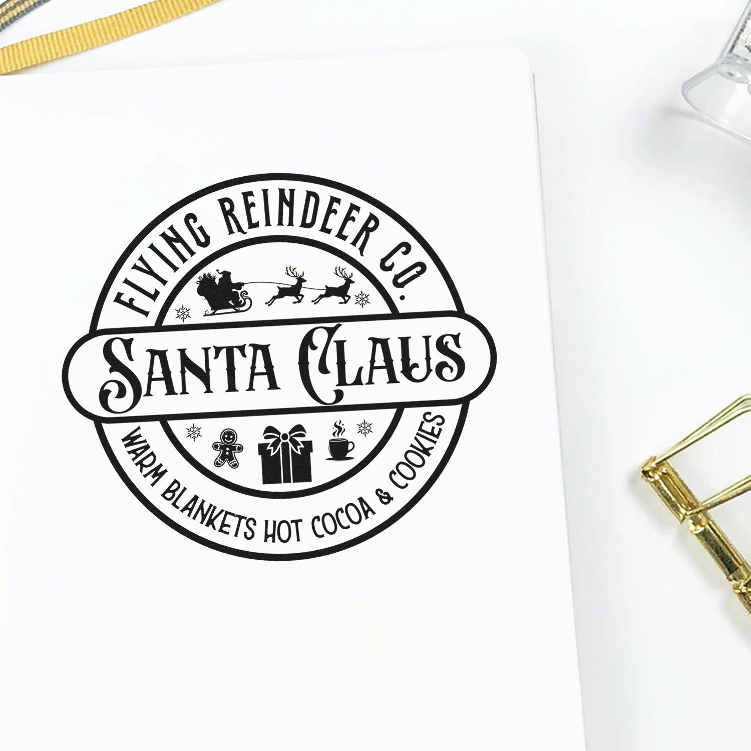 Santa Claus Flying Reindeer Co. custom rubber stamp with holiday icons for Christmas cards, gift tags and festive packaging
