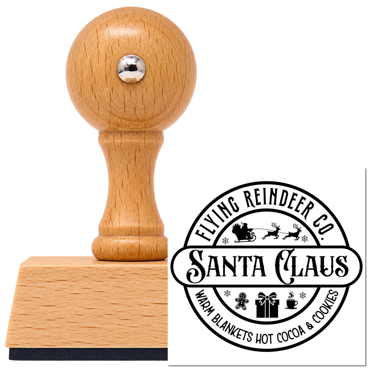 Flying Reindeer Co. Santa Claus Vintage Pro rubber stamp in European beech wood with a round knob handle, shown beside its black imprint.