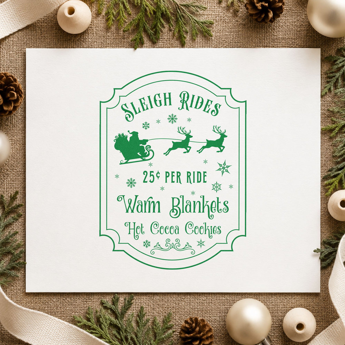 Sleigh Rides Warm Blankets craft stamp imprint in green ink on a handmade project, one idea being ride stub slips.