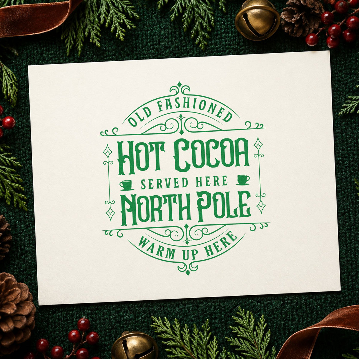 Old Fashioned North Pole Cocoa craft stamp imprint in green ink on a handmade project, one idea being free cup slips.