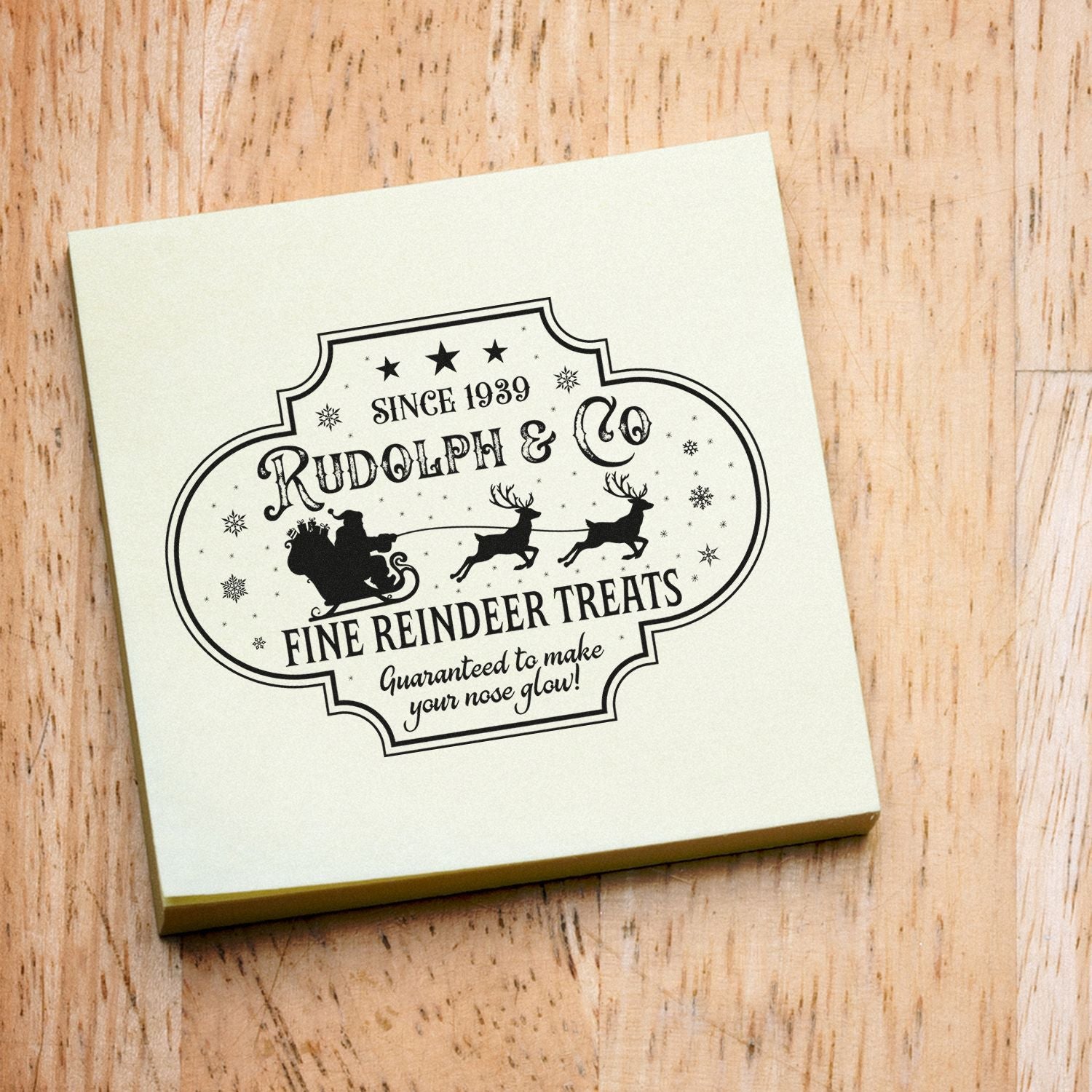 Custom Christmas rubber stamp design featuring Rudolph & Co fine reindeer treats with vintage Santa sleigh and reindeer label.