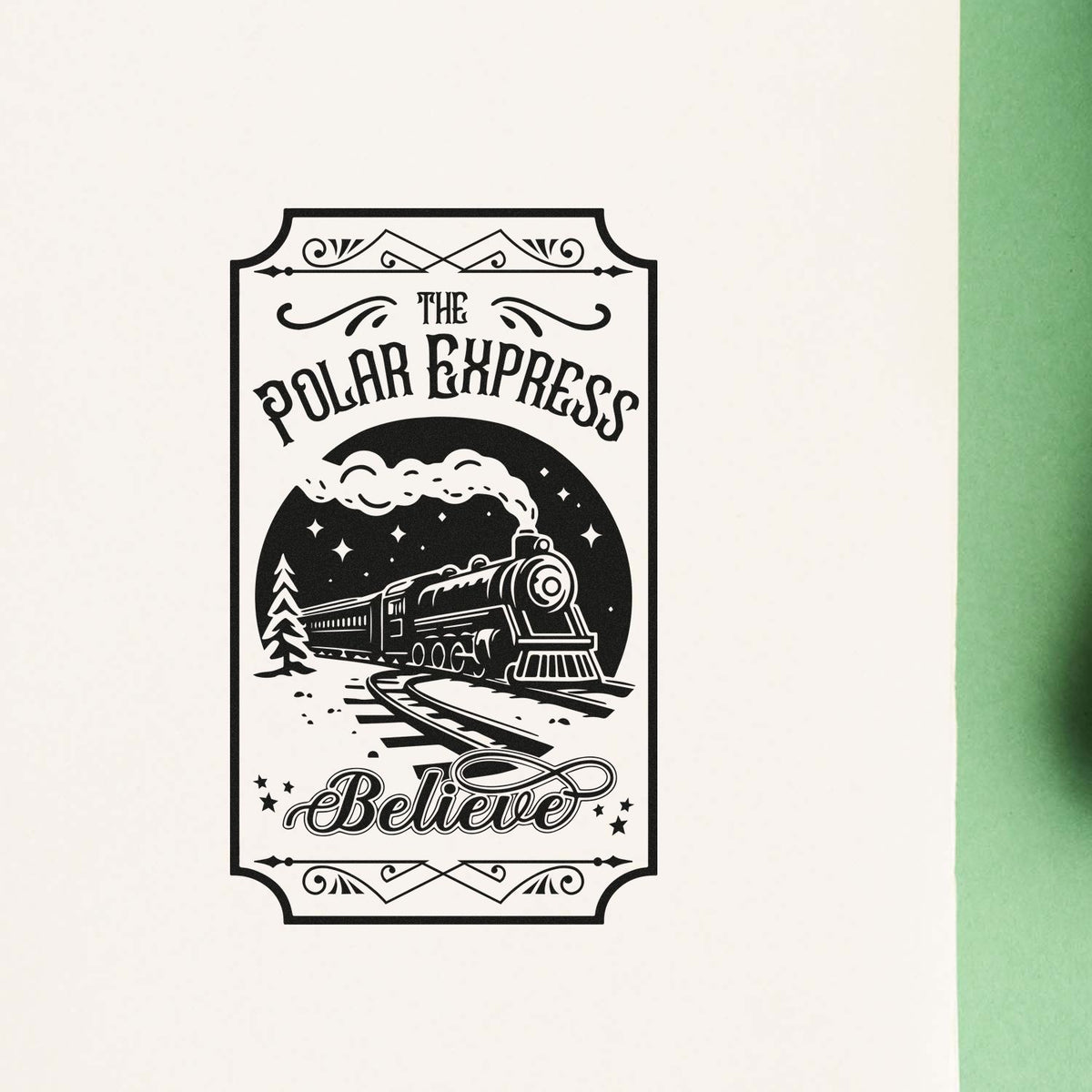 Premium Wooden Polar Express Believe Train Circular Layout Stamp - Vintage Pro imprint stamped in black ink. A vertical vintage sign reads "The Polar Express" and "Believe" around a steam train in a snowy circular scene.