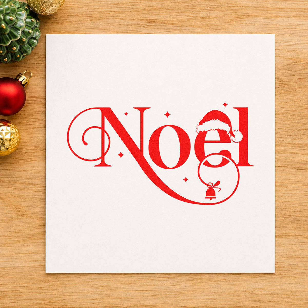 Noel Santa Hat Bell craft stamp in red ink on cardstock, an easy option for ribbon face printing.