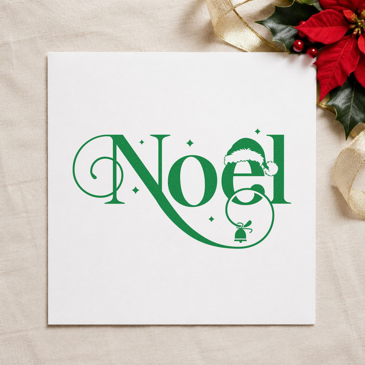Noel Santa Hat Bell craft stamp imprint in green ink on a handmade project, one idea being class sample cards.