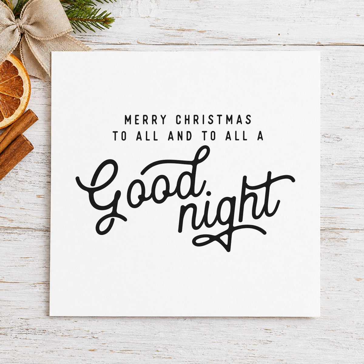 Merry Christmas Good Night craft stamp imprint in black ink on a handmade project, one idea being storybook gift tags.