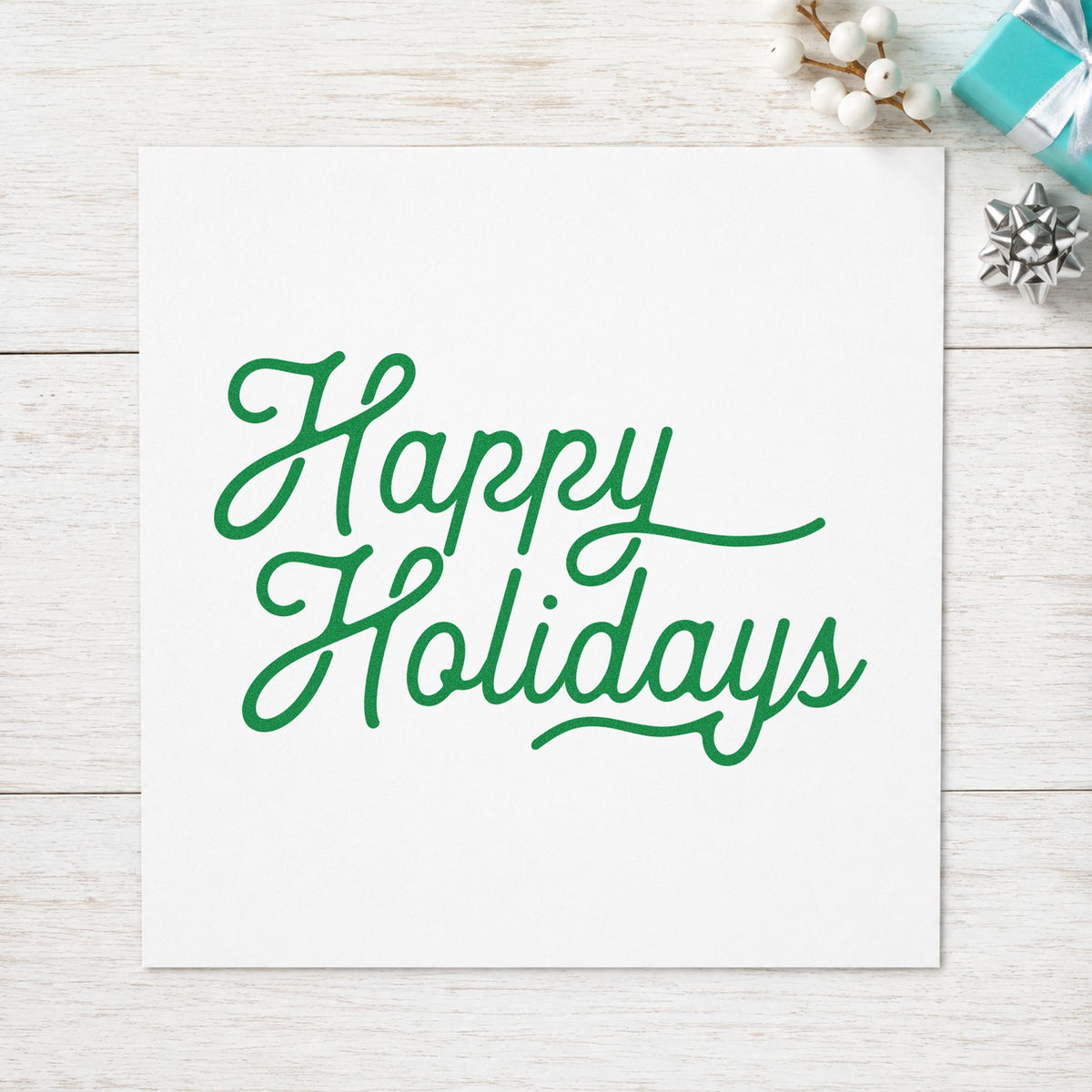 Happy Holidays Flowing Script craft stamp in green ink on cardstock, an easy option for signature album page.