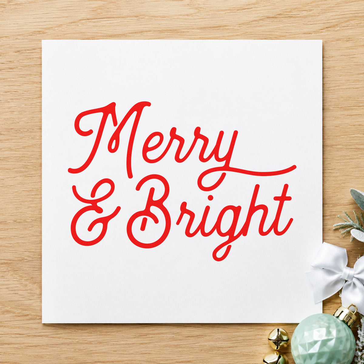 Merry And Bright Script rubber stamp shown in red ink, stamped for projects such as pen case labels.