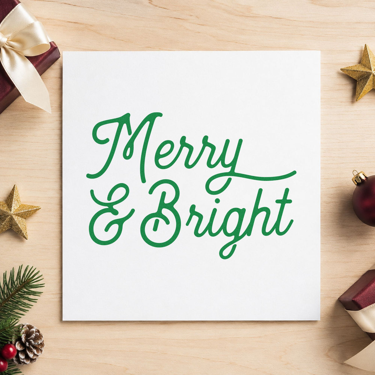 Merry And Bright Script craft stamp imprint in green ink on a handmade project, one idea being studio class cards.