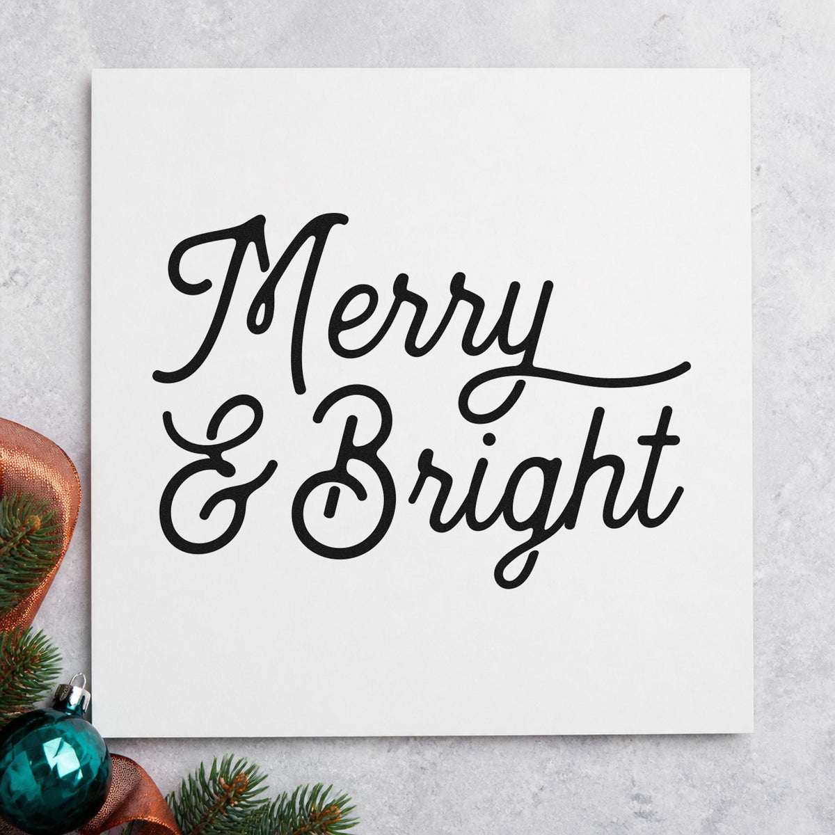 Merry And Bright Script rubber stamp printed in black ink, ready for letter flourish cards and similar paper crafts.