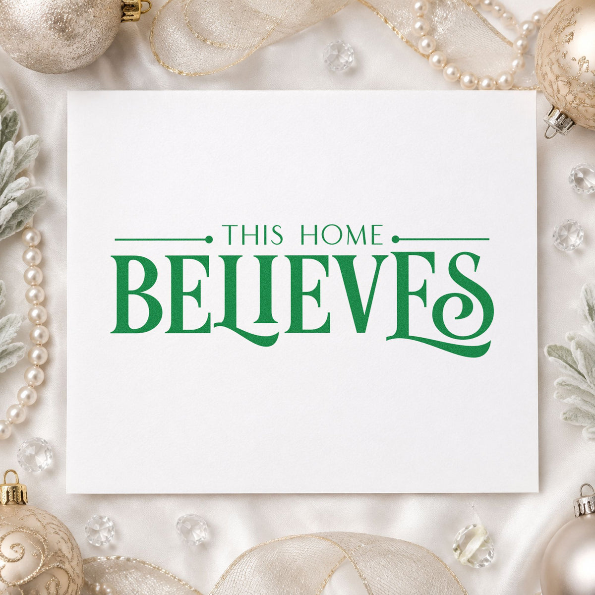 This Home Believes Serif craft stamp imprinted in green ink on paper, a design suited to framed hall plaque.