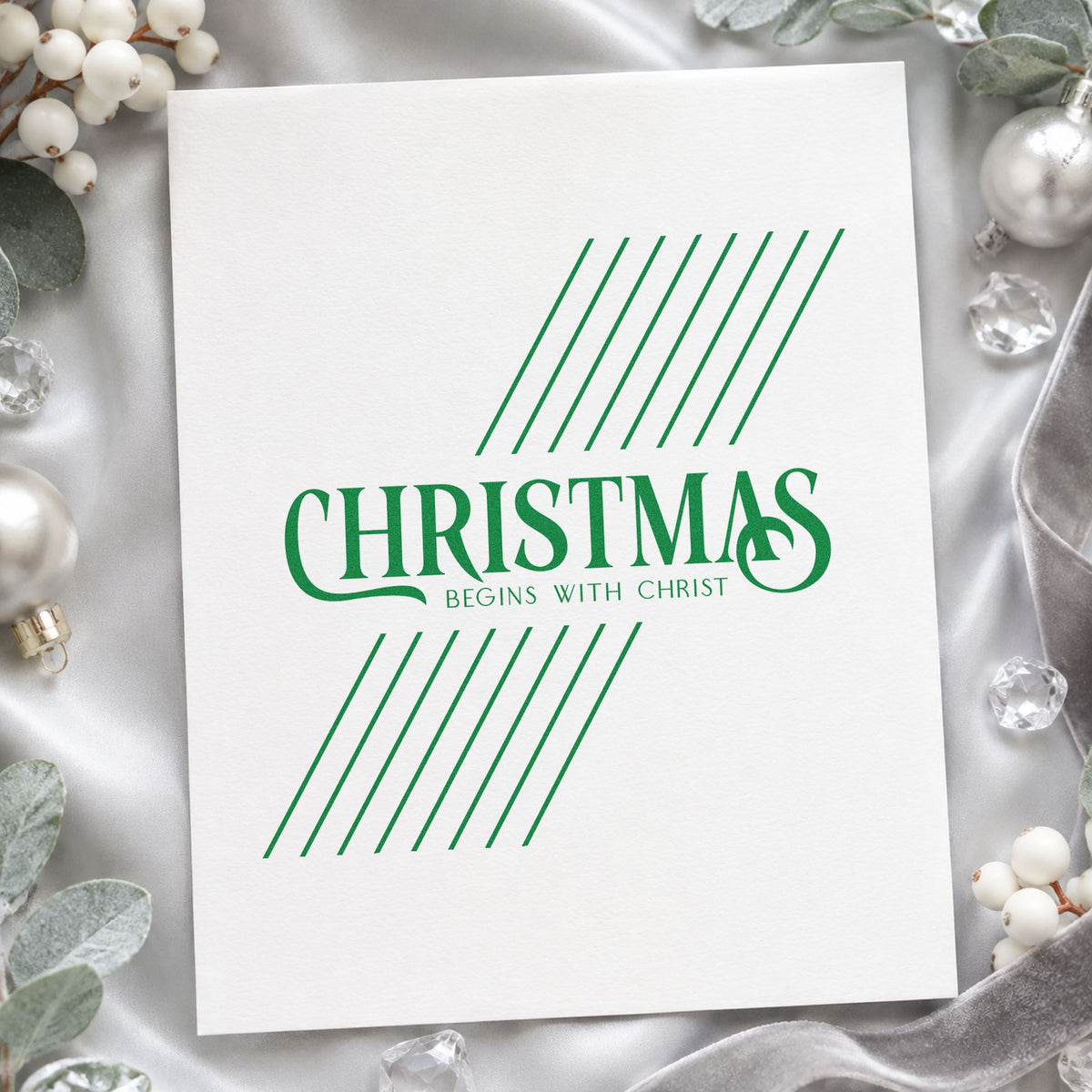 Christmas Begins With Christ craft stamp imprint in green ink on a handmade project, one idea being series handout cards.