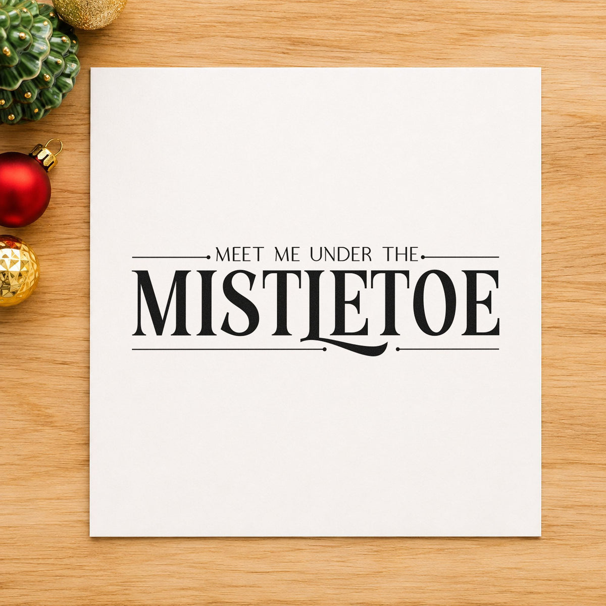 Meet Me Under The Mistletoe rubber stamp printed in black ink, ready for letter paper header and similar paper crafts.