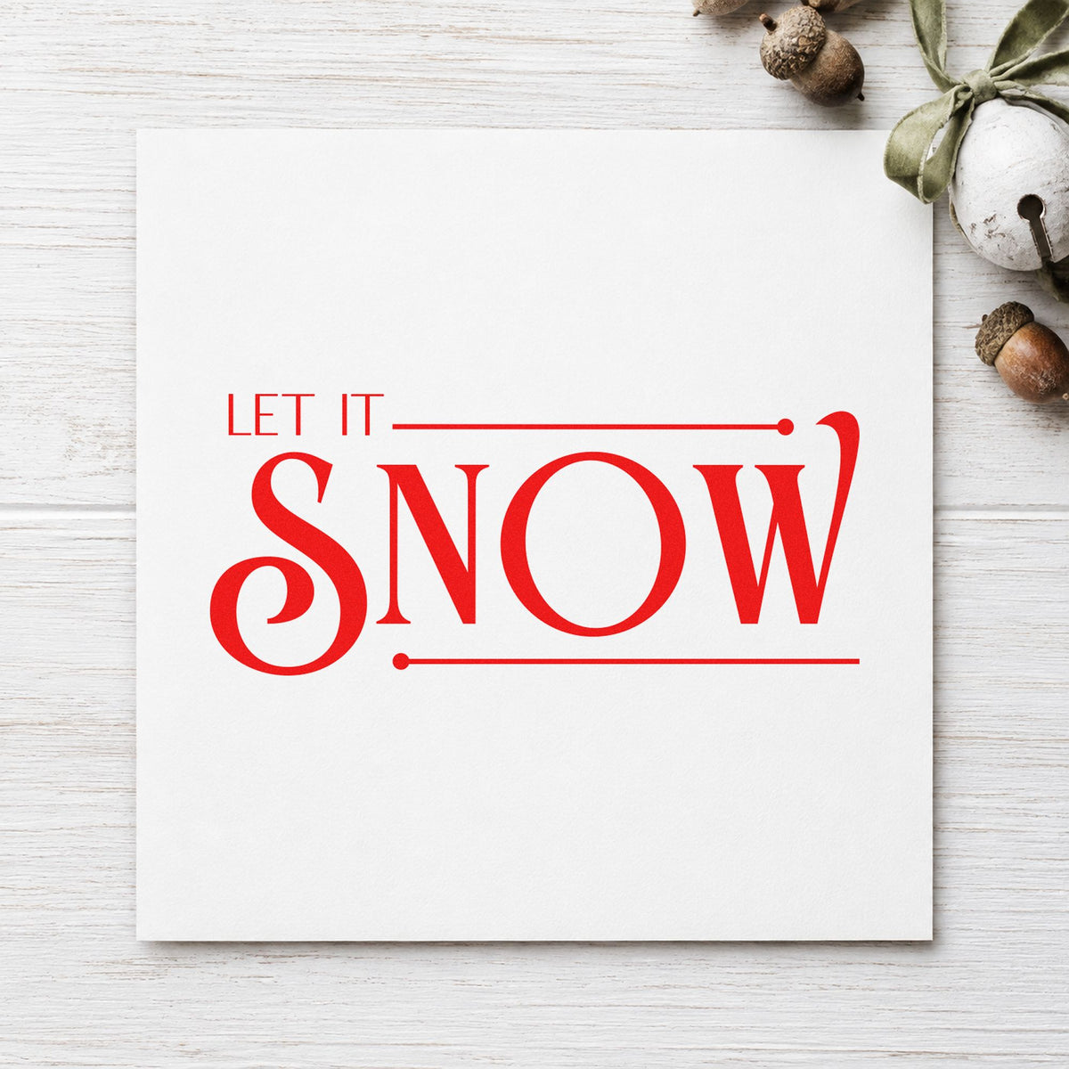 Let It Snow Serif rubber stamp shown in red ink, stamped for projects such as rack size labels.