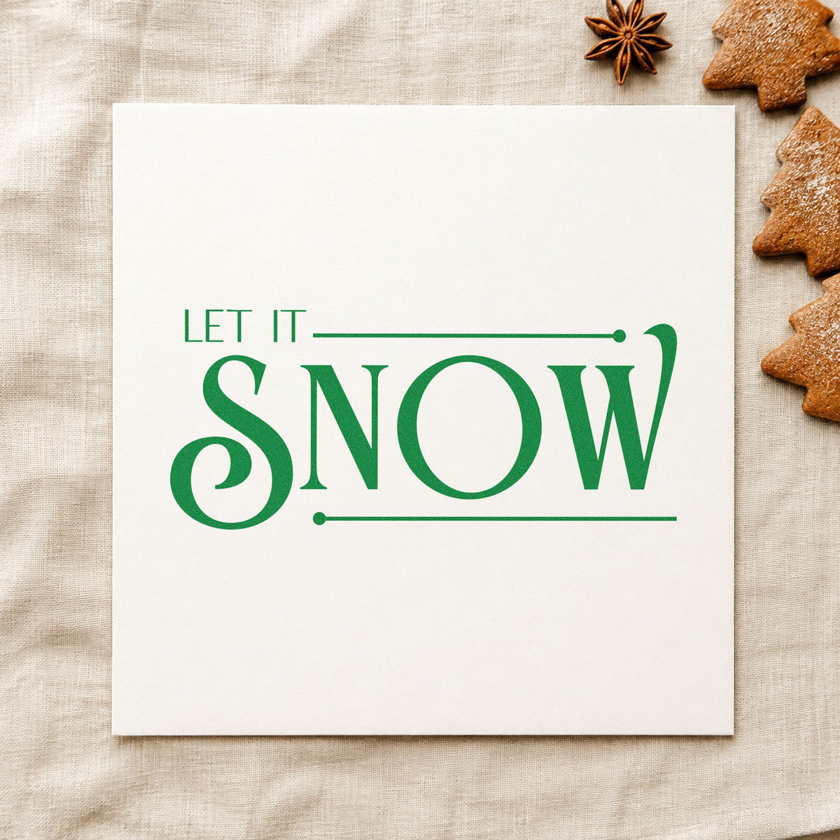 Let It Snow Serif craft stamp imprint in green ink on a handmade project, one idea being lookbook slip cards.