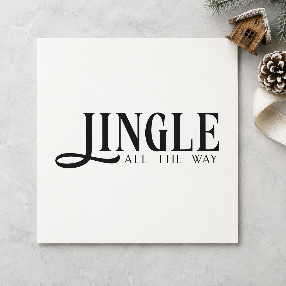 Jingle All The Way Serif rubber stamp printed in black ink, ready for sweeping descender cards and similar paper crafts.