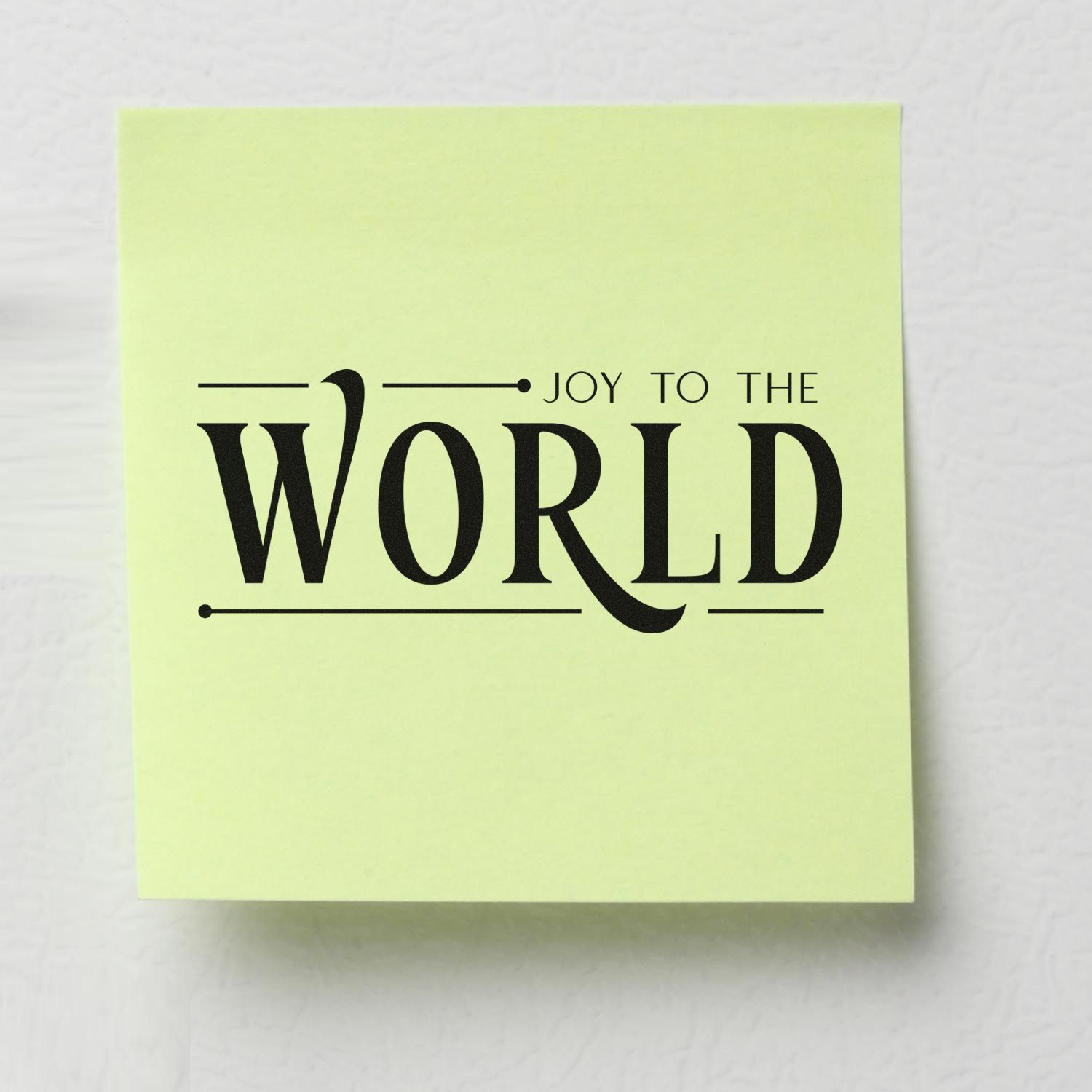 Joy to the World rubber stamp on yellow sticky note, ideal for holiday card making and festive craft projects.