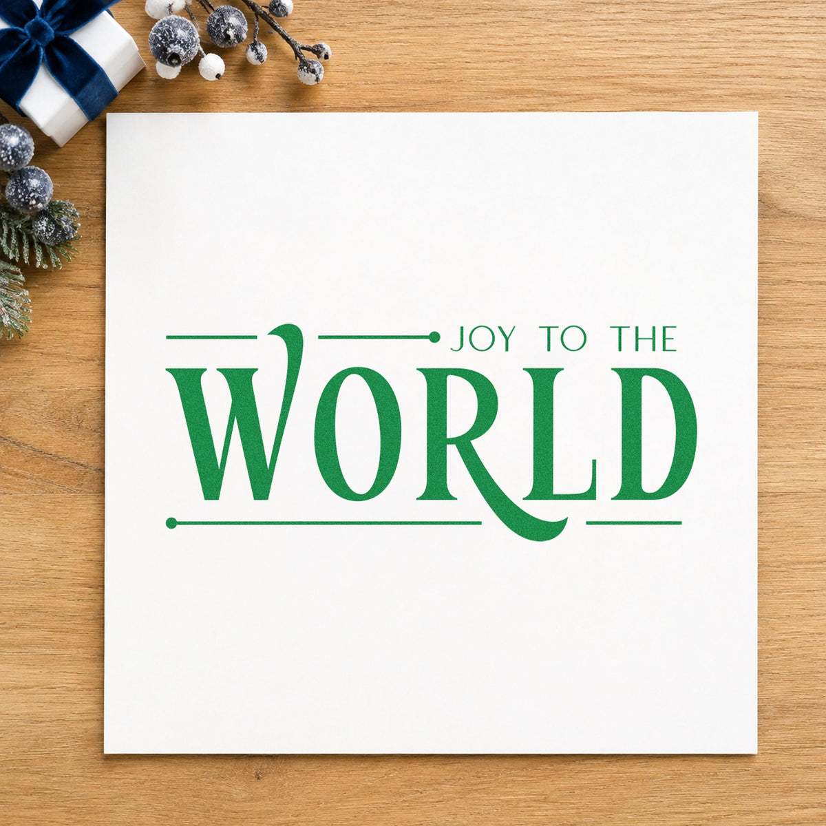Joy To The World Serif craft stamp imprinted in green ink on paper, a design suited to framed gallery last.