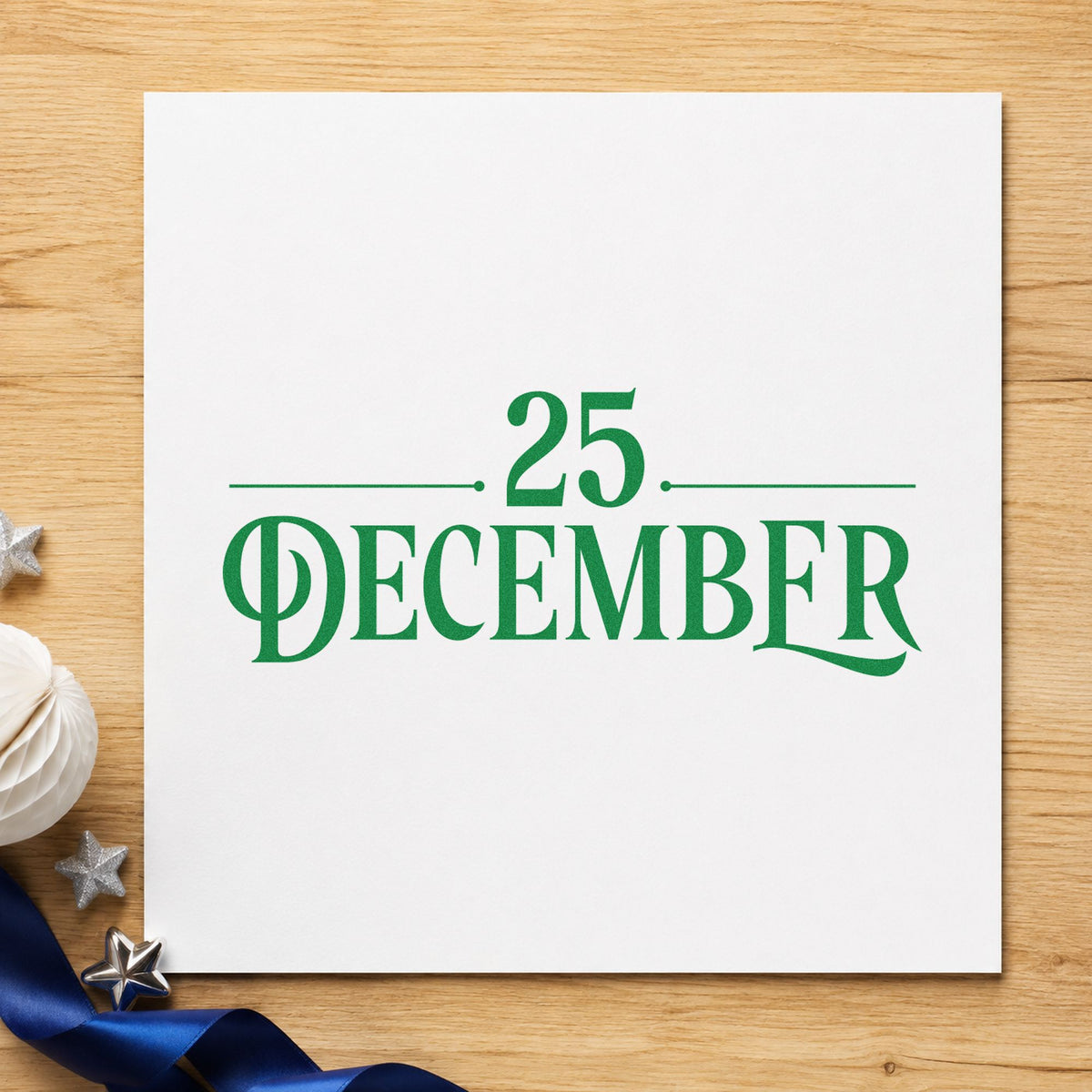 Twenty Five December Lettering craft stamp imprint in green ink on a handmade project, one idea being reservation slips.