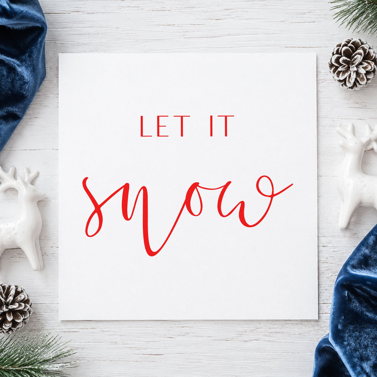Let It Snow Fine Script rubber stamp shown in red ink, stamped for projects such as oil bottle labels.