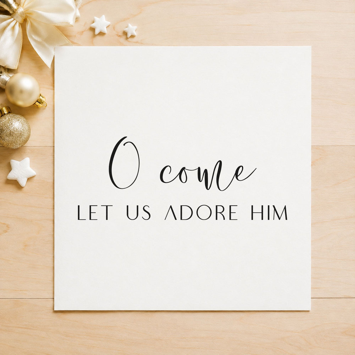 O Come Let Us Adore Him craft stamp imprint in black ink on a handmade project, one idea being bread cloth tags.