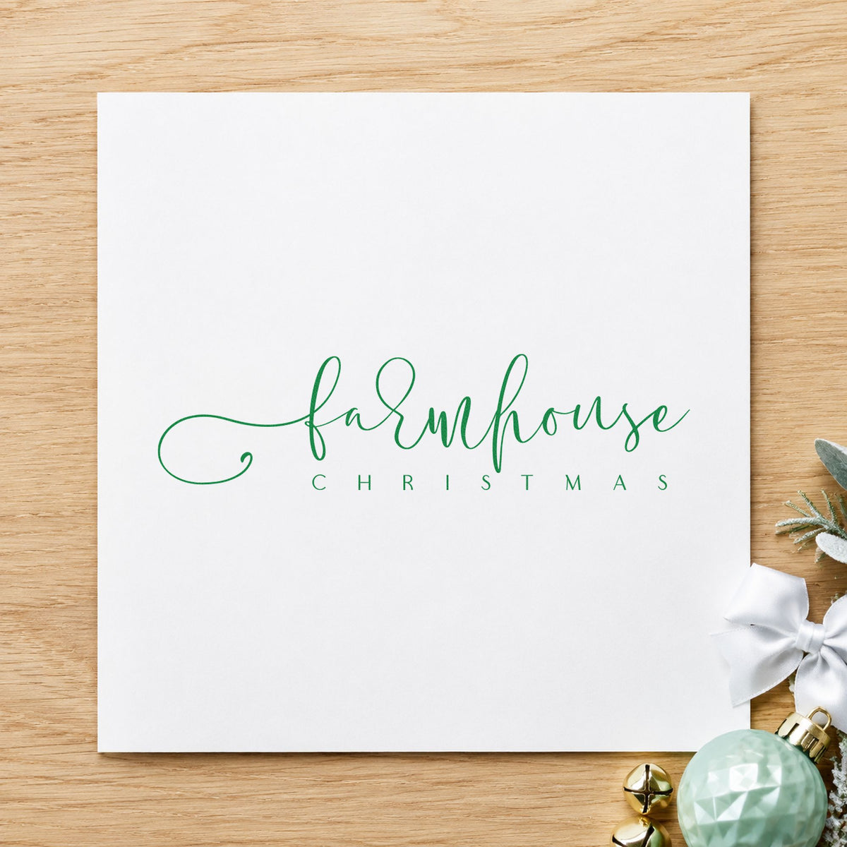 Farmhouse Christmas Fine Script craft stamp imprinted in purple ink on paper, a design suited to framed shiplap wall.
