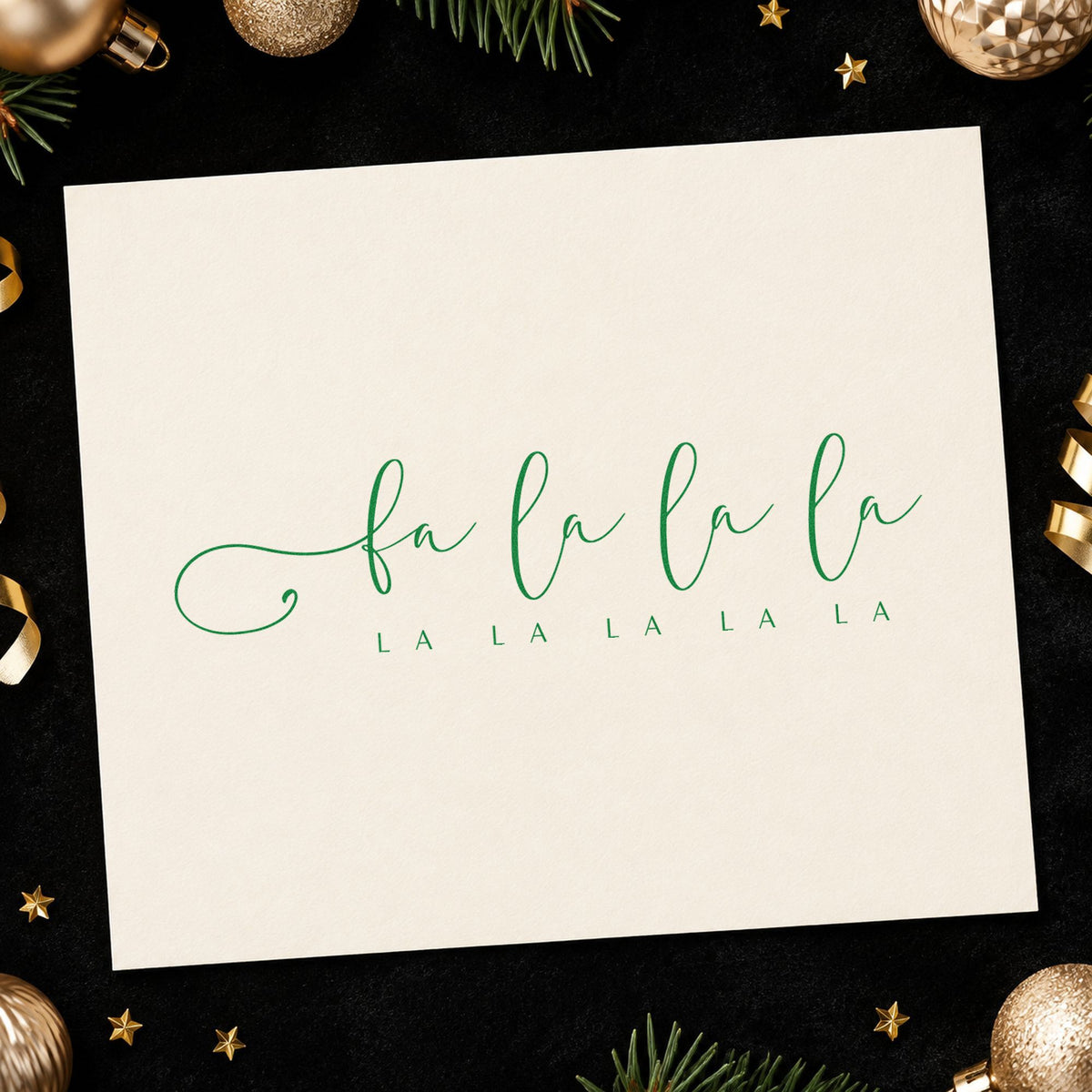 Fa La La Holiday Script craft stamp imprint in purple ink on a handmade project, one idea being sing along slips.
