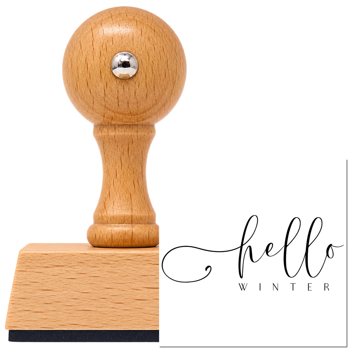 Hello Winter Fine Script Vintage Pro rubber stamp in European beech wood with a round knob handle, shown beside its black imprint.
