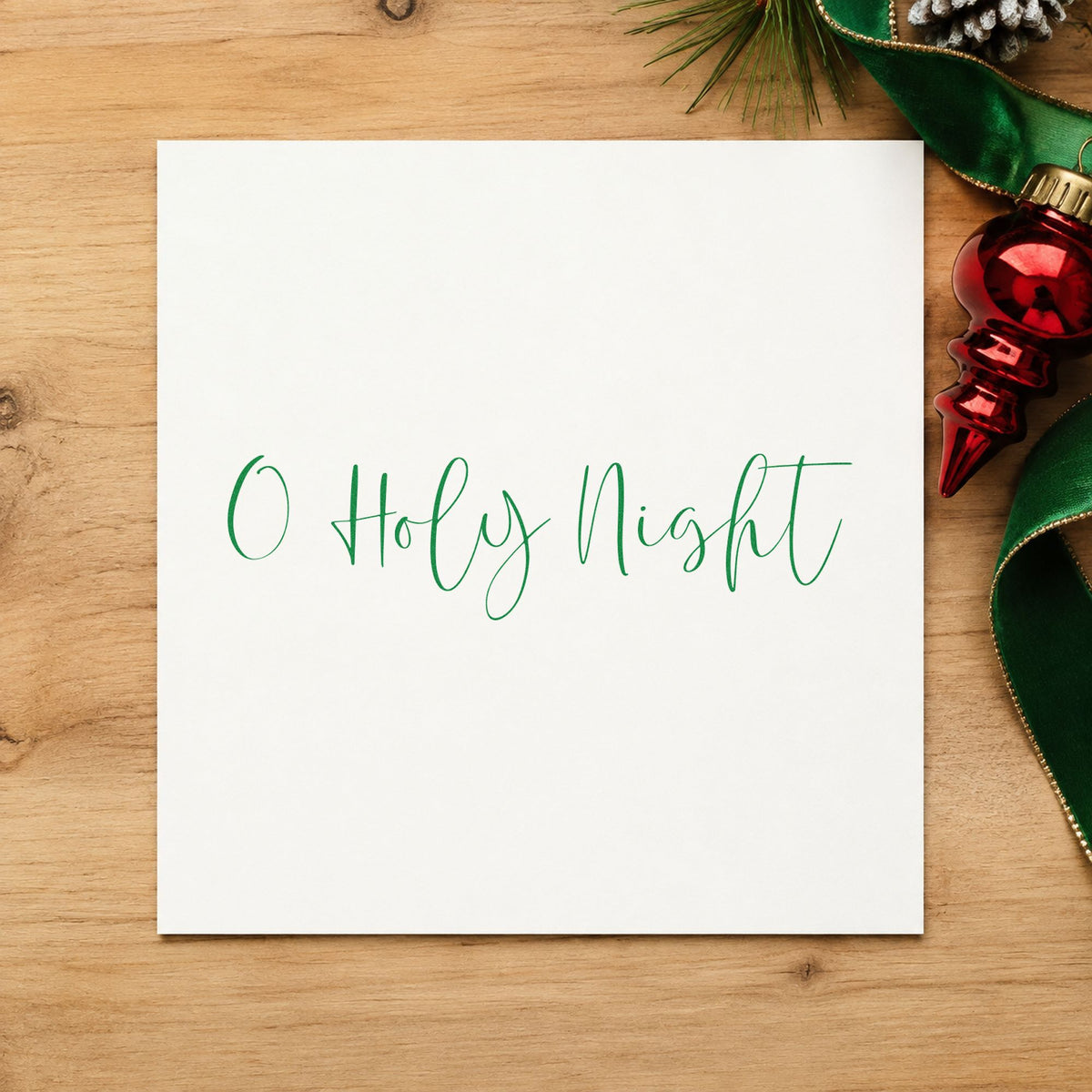 O Holy Night Fine Script craft stamp imprint in purple ink on a handmade project, one idea being menu rule cards.