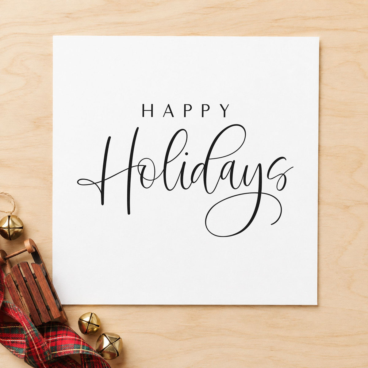 Happy Holidays Looped Script rubber stamp printed in black ink, ready for looping tail cards and similar paper crafts.