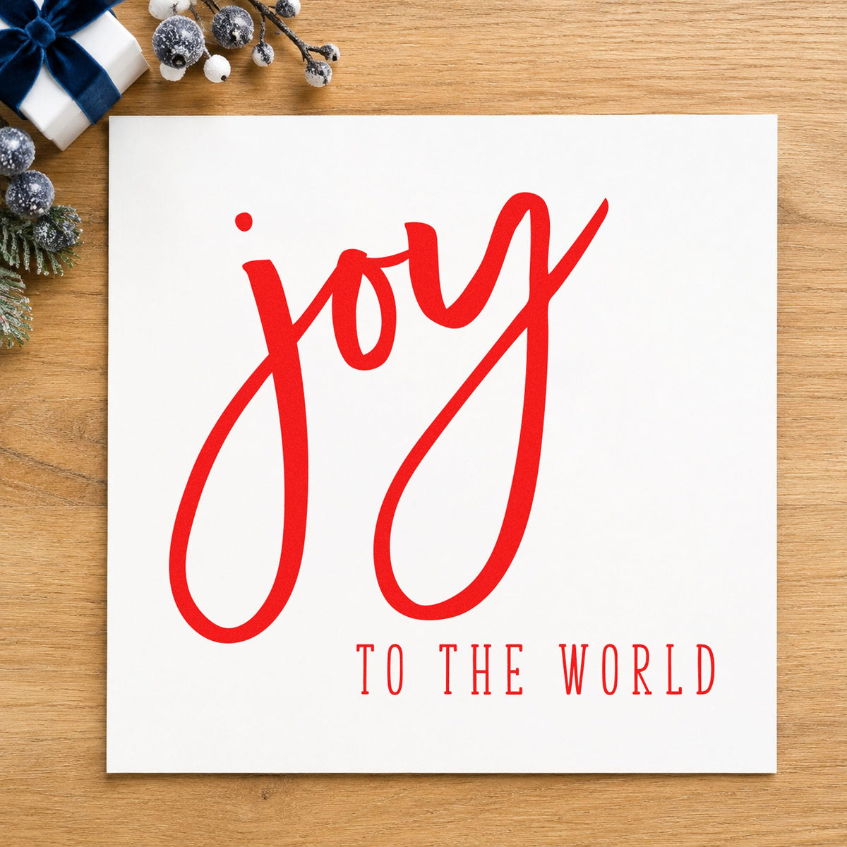 Joy To The World Brush craft stamp in red ink on cardstock, an easy option for panel face printing.