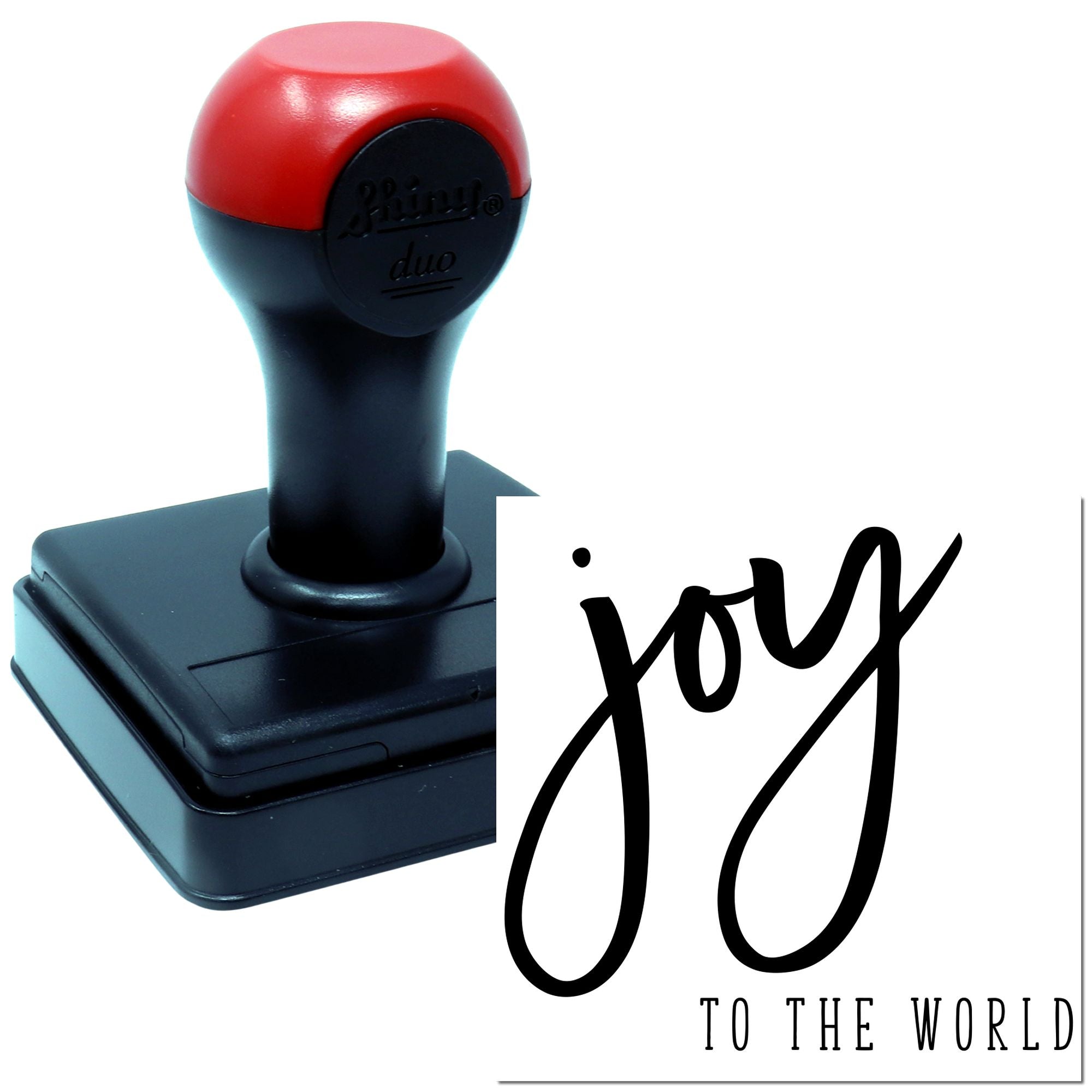 Self-inking rubber stamp with custom Joy to the World imprint for holiday crafts.