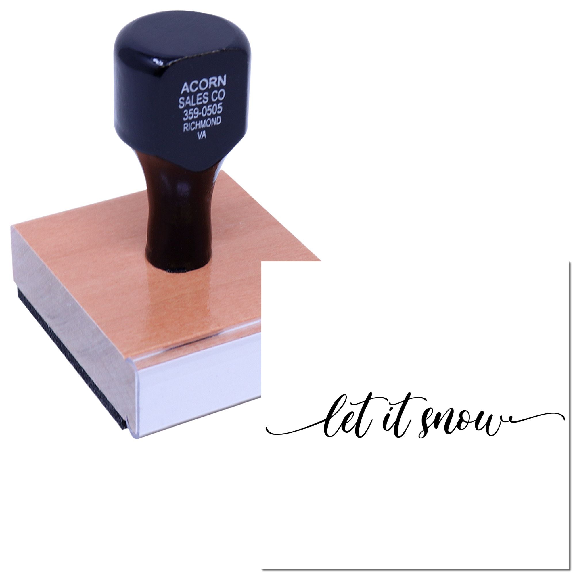 Custom rubber stamp with let it snow script, shown on a mounted stamp block for holiday crafts and paper stamping.