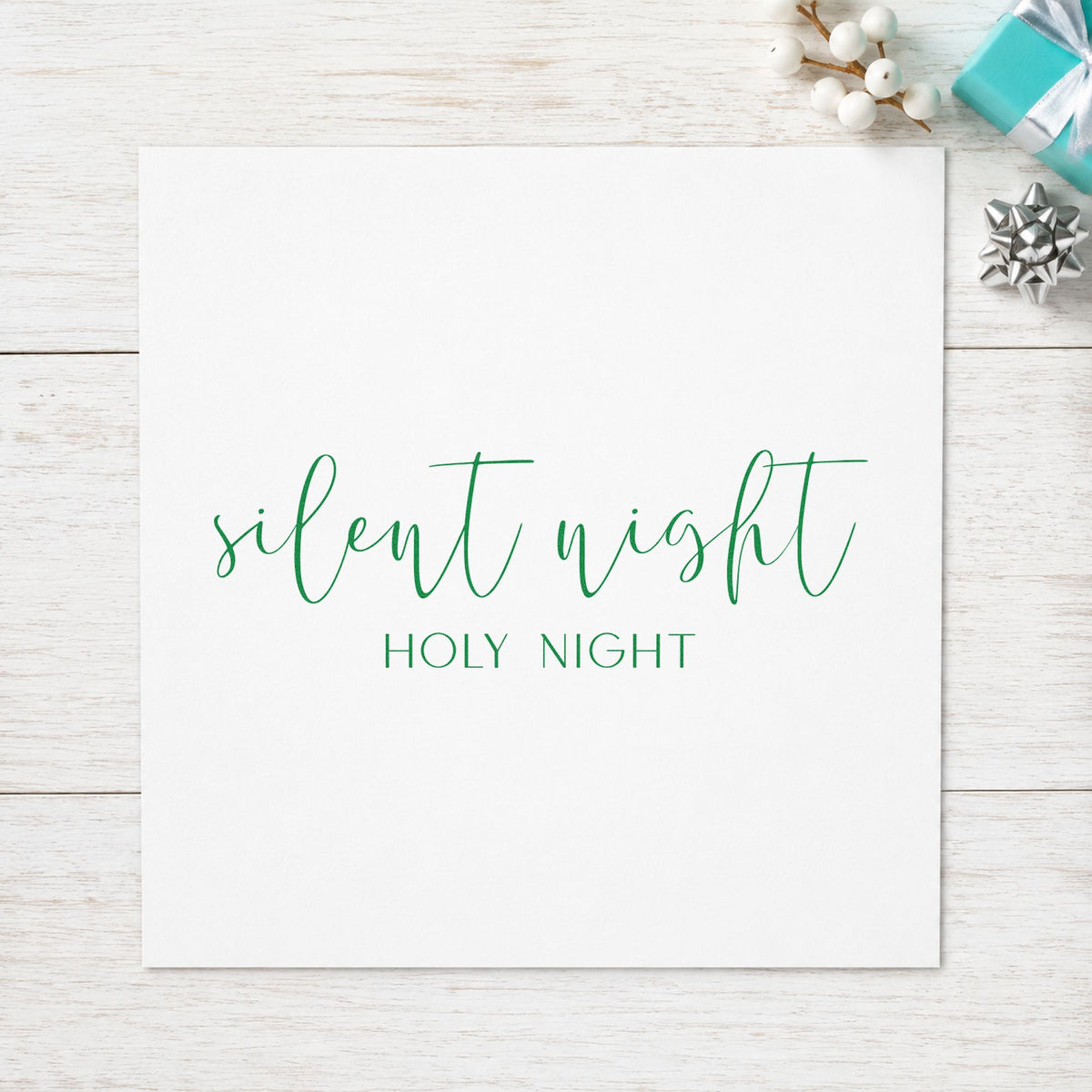 Silent Night Holy Night Script craft stamp imprint in purple ink on a handmade project, one idea being vigil slip cards.