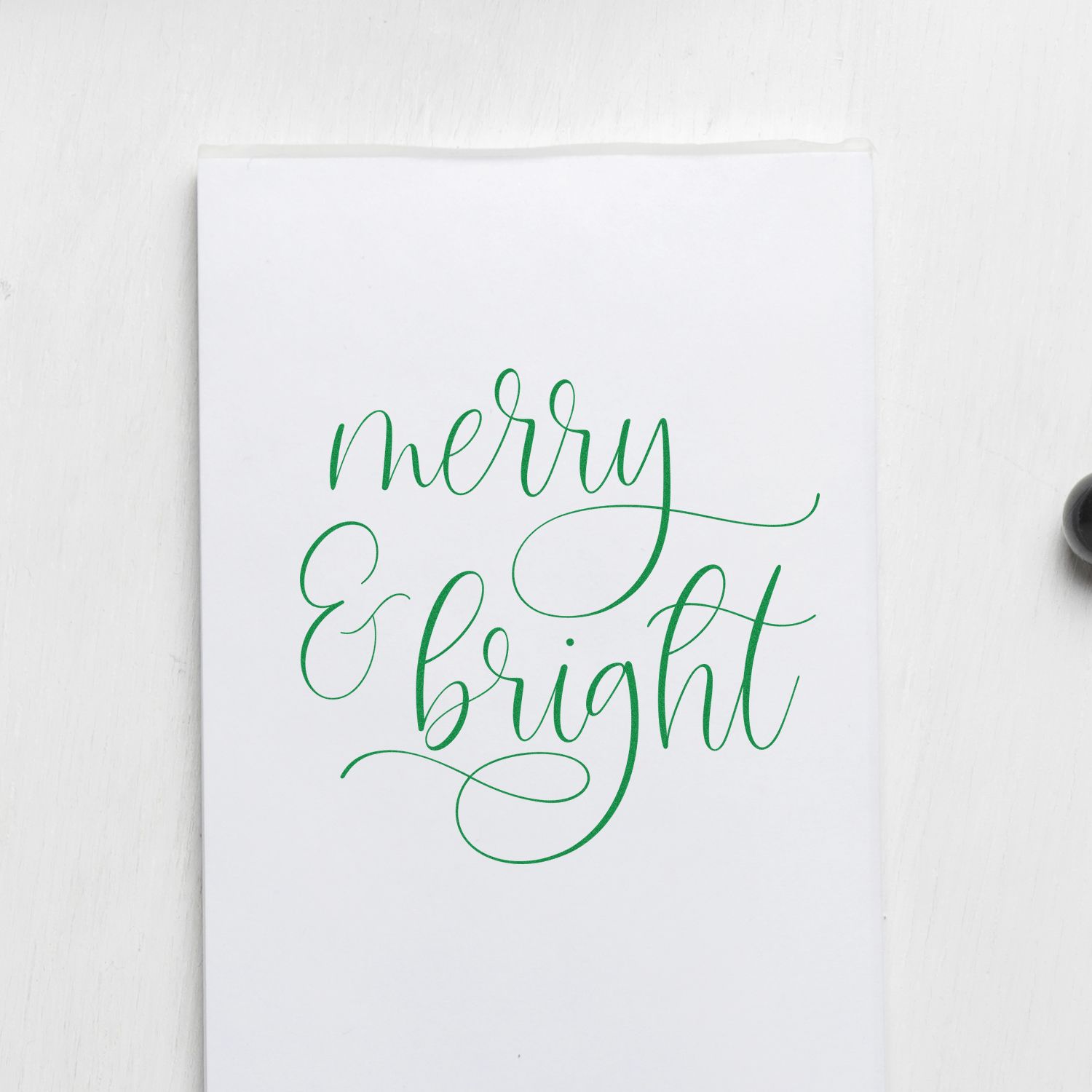 Merry and Bright holiday rubber stamp in green script for Christmas cards, gift wrap, and festive stationery.